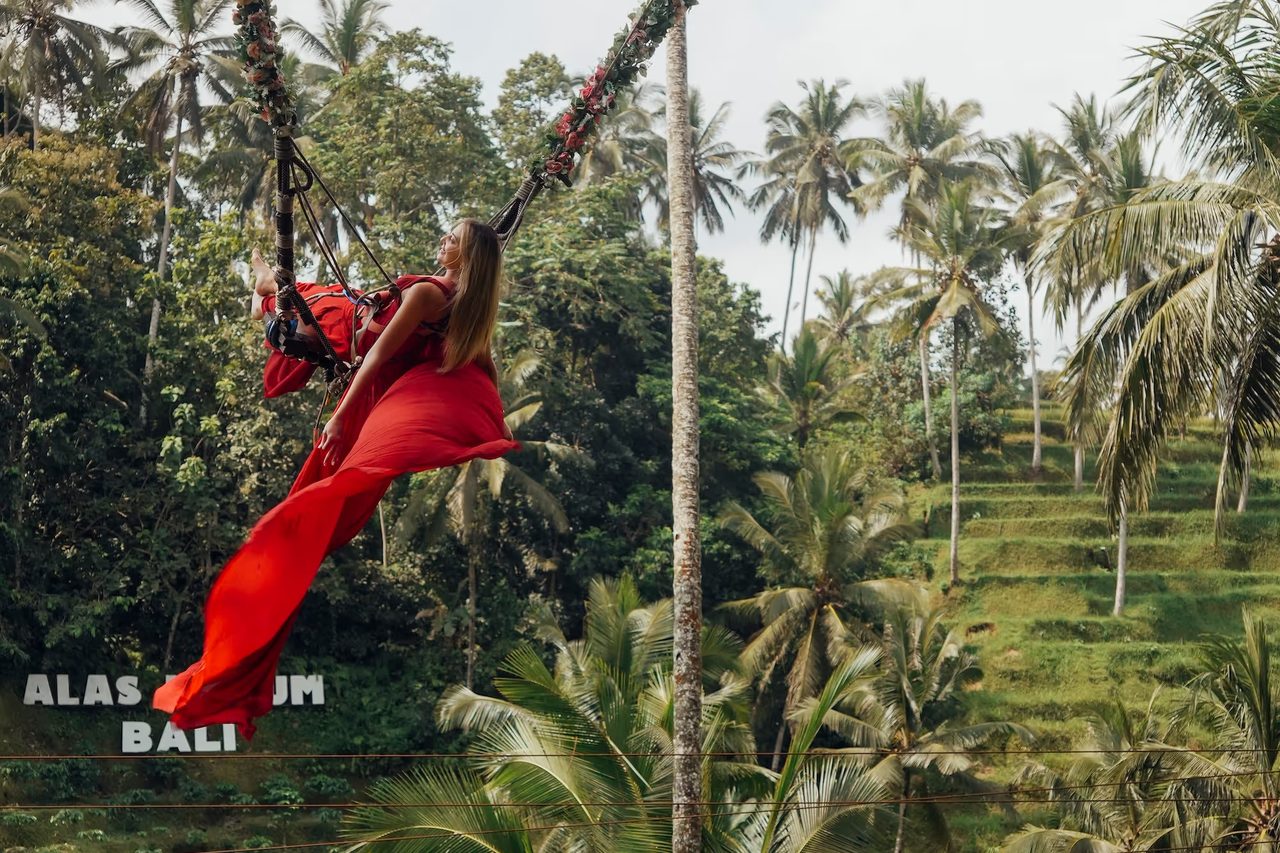 A moment from a real Beyond Bali Travel trip — a swing over the Bali jungle