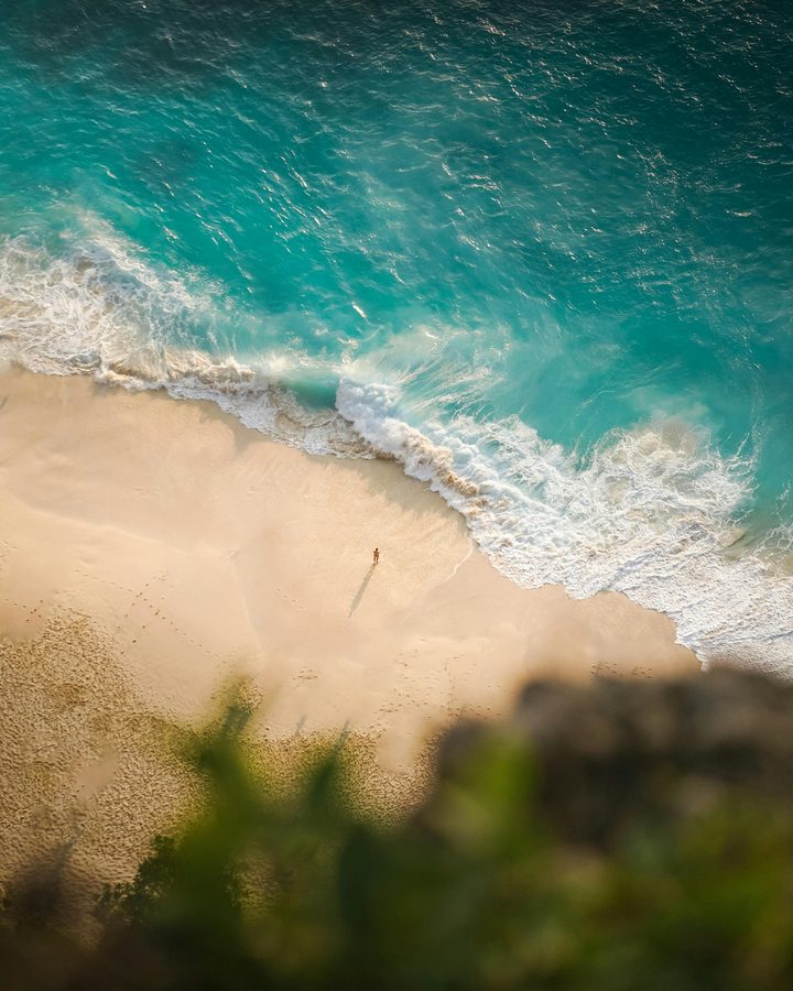 Aerial of a hidden turquoise beach on Nusa Penida, Bali