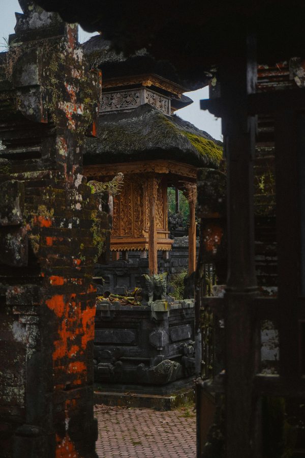 Ancient moss-covered Balinese temple shrine in the jungle