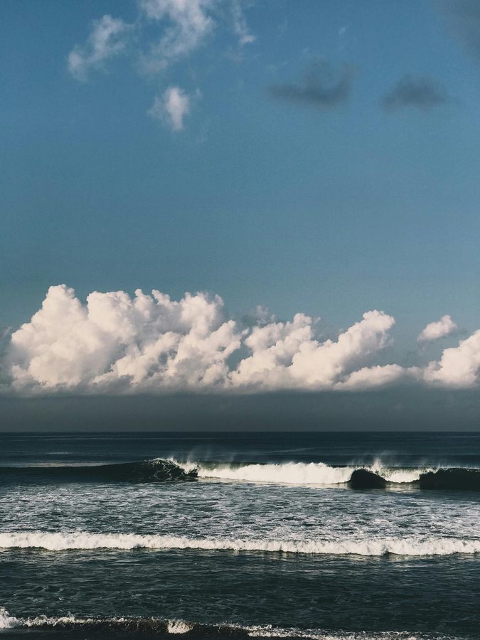 Dramatic clouds over the Bali surf coast